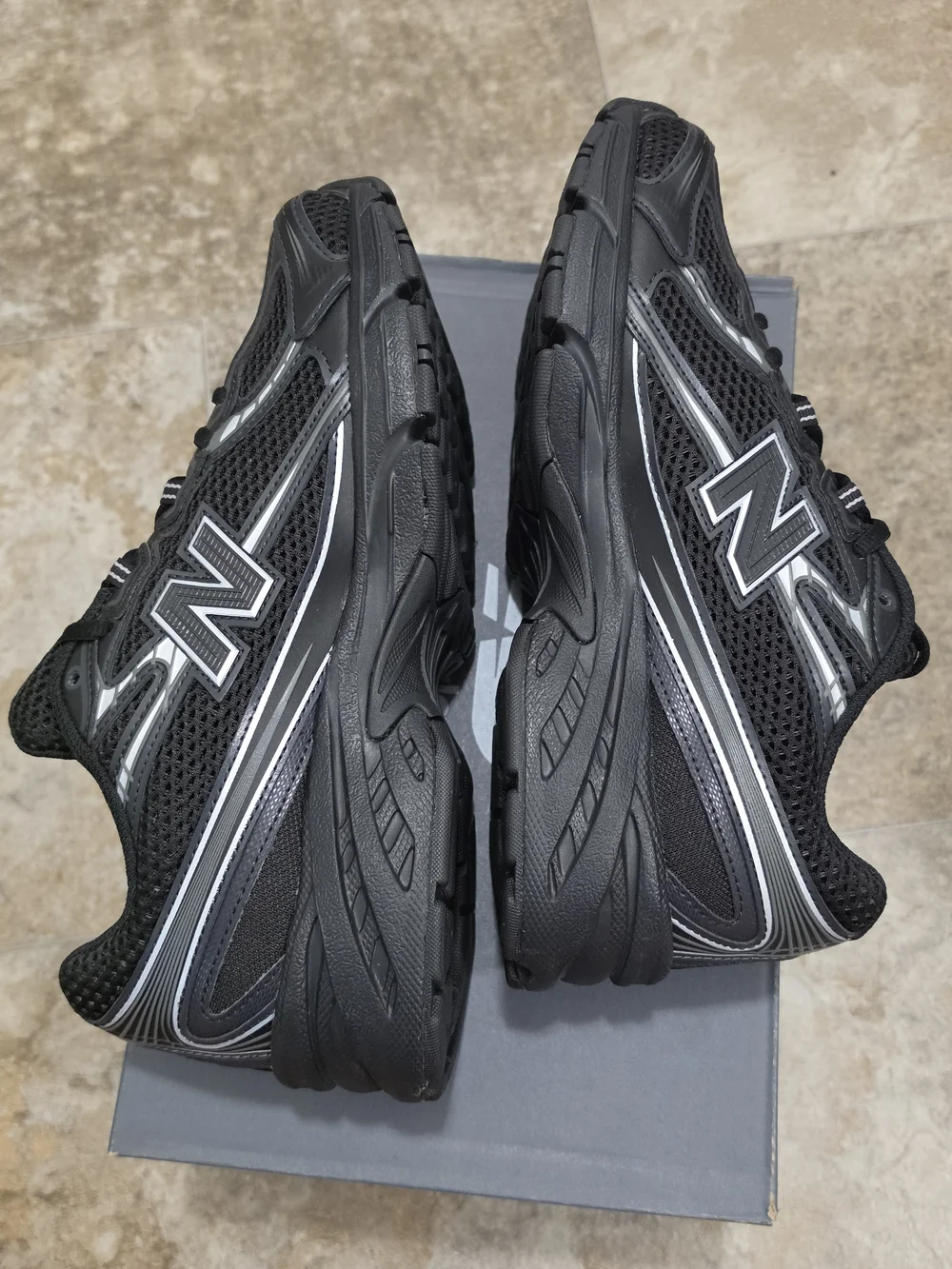 New Balance 740 sneakers / Black and Silver Metallic colorway
